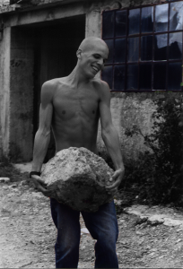 17 years old, carrying a big boulder
